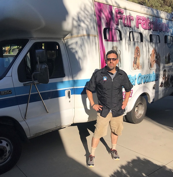 Juan and his grooming van